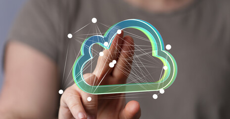 Hand interacting with a digital cloud.  Represents network, data, storage, and technology.