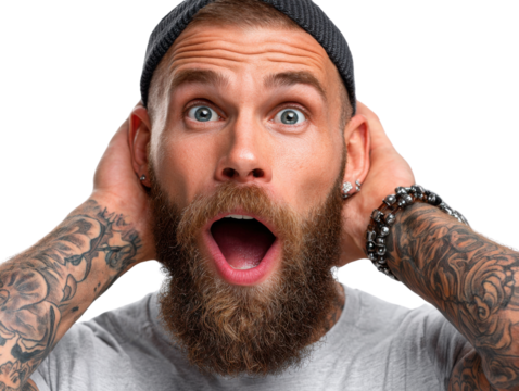 Startled Man's Expression: A close-up of a man with a beard, tattoos, and beanie, expressing shock with widened eyes and an open mouth.