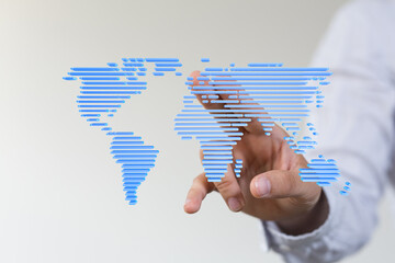 Hand interacting with a digital world map, representing global connectivity and networking.
