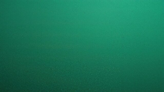 Textured metal plate covered with green plastic