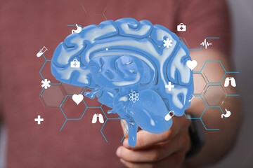 3D rendering of a human brain with healthcare icons.  Perfect for medical, health, and technology...