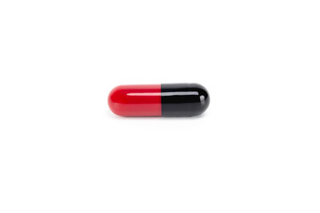 A single red and black medicine capsule, a potent drug or pill for specialized treatment. This icon...
