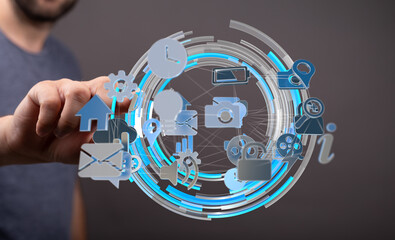 Hand interacting with a futuristic digital interface showing various app icons and connections.