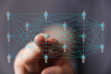 Image of a finger interacting with a digital network of interconnected people, symbolizing global...