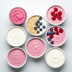 Overhead view of yogurt bowls with fruit and oats
