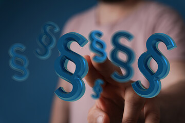 Abstract image of 3D paragraph symbols. Perfect for legal, justice, and law concepts.