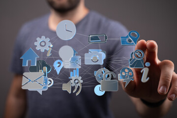 Person uses finger to interact with a network of digital icons representing various online services...