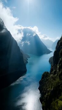Sunlight Streaming Over Majestic Fjord with Deep Blue Water