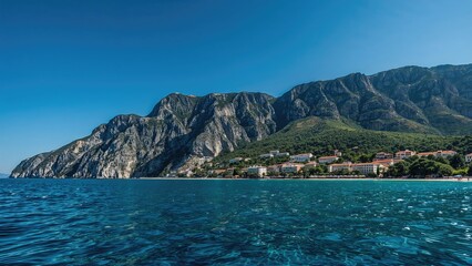 Obraz premium Lodging facilities located at the bottom of towering cliffs