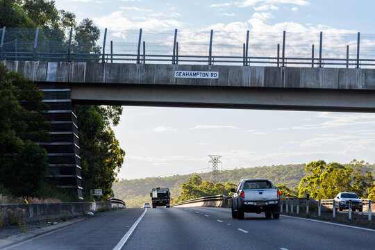overpass bridge over highway road with cars traveling on New England Highway in NSW Australia