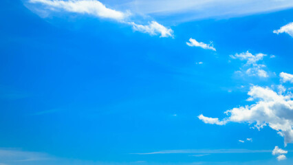 White clouds pon blue sky as a nature background.