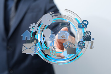 Stock photo of a person interacting with a digital interface displaying various application icons.