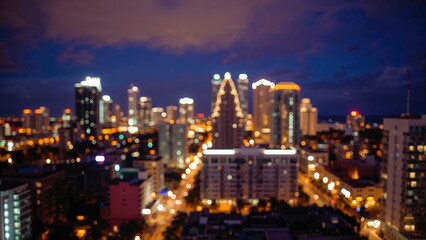 Fototapeta premium Dusk brings a soft, abstract illumination to the city skyline.
