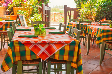 Traditional Mediterranean outdoor dining area with vibrant table decor