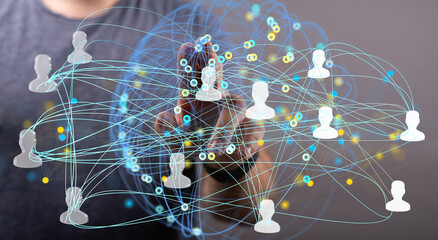 Image depicts a network of interconnected people, symbolizing global communication and...