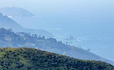 Coastal view from Soberanes Canyon Trailhead in Garrapata State Park along Highway 1. Rolling green...