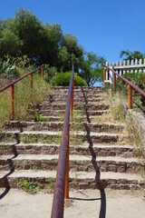 Stairs at the historic California Spanish mission San Juan Bautista leading over the San Andreas...