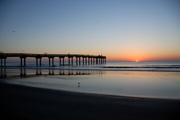 fishing pier at sunrise