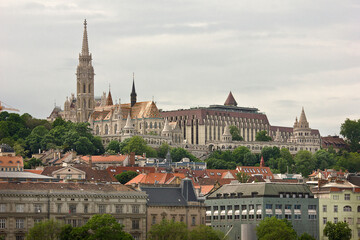 Fototapeta premium View of the Fisherman's Bastion and St Matyas Church on the banks of the Danube in Budapest Hungary
