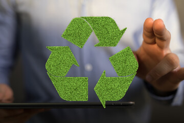 Eco-friendly concept image featuring a green recycling symbol. Perfect for sustainability and...