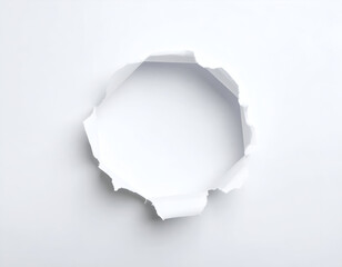 A rough circular tear in crisp white paper reveals an intriguing void with subtle shadows and depth.