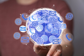 Image depicting a global network of communication, showcasing email, phone, and internet...