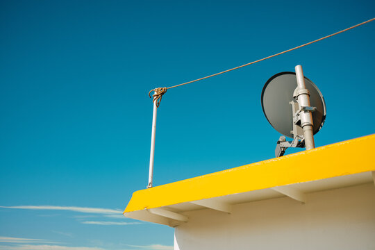 Part of ship roof against blue sky