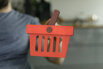 Person holding a digital shopping cart icon.  E-commerce, online shopping concept.