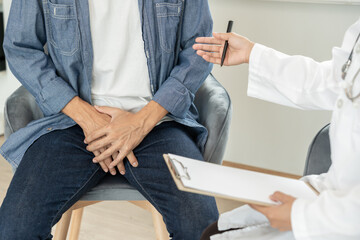 Man hold hand in front of private parts feeling discomfort and consult doctor. Venereal, testicular...