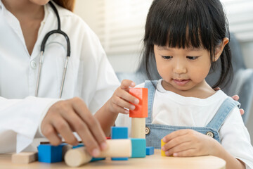 Pediatricians are checking the children development according to the appropriate age, doctors...