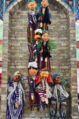 Colorful Uzbek traditional puppets displayed in Bukhara, Uzbekistan