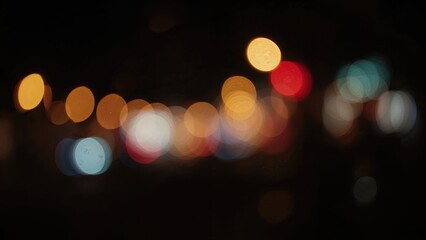 Bright multicolored soft-focus light spots background, metropolitan evening idea
