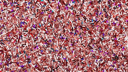 Colorful metallic confetti texture background featuring a mix of red, silver, and purple shiny pieces in a random distribution