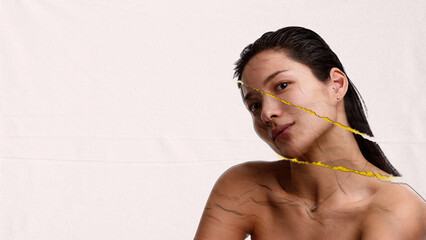 Surreal composition. Portrait of woman with torn transparent face and thoughtful expression....