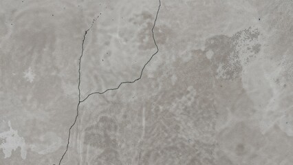 Obraz premium Aged concrete surface with visible cracks and holes, suitable as a grey textured background.