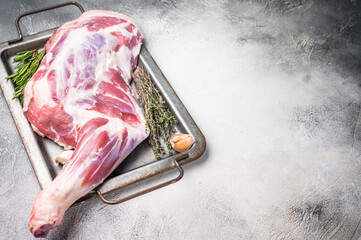 Uncooked fresh goat shoulder leg with rich marbling, ideal for gourmet dishes and family feasts....