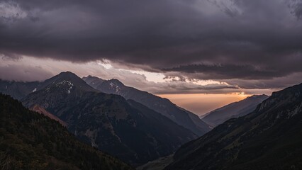 Lovely photo capturing a mountain with a moody sky backdrop
