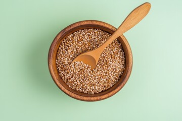 An&nbsp;appetizing&nbsp;vegan&nbsp;cuisine&nbsp;notion&nbsp;with&nbsp;wood&nbsp;dish&nbsp;with&nbsp;buckwheat&nbsp;grits&nbsp;with&nbsp;spoon&nbsp;over&nbsp;pale green setting lovely hue delish food, Generative AI.