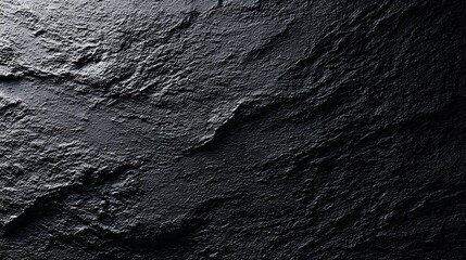 Textured black charcoal abstract background realistic powdery rough textures natural matte lighting subtle shadows and ultra HD photo realistic finish captured from a ground level angle