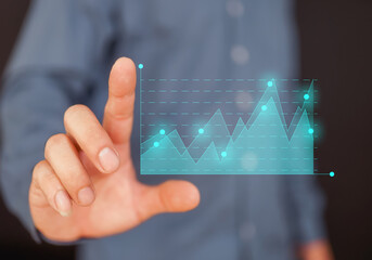 Hand holding graph with percentage, special offer of shopping department store discount and tax concept, adjusting interest rates, raising interest rates to fight inflation, returns on investments.