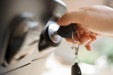 he car owner took the car key to the keyhole to start the car. 
