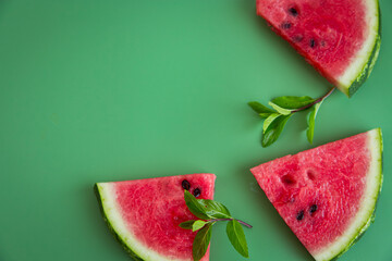 Healthy snack: close-up of watermelon triangles and mint