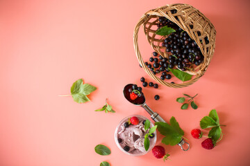 Homemade berry dessert from blackcurrant and strawberries