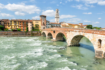 Obraz premium Ponte Pietra bridge is a Roman arch stone bridge crossing the Adige River in Verona, Veneto region in Italy