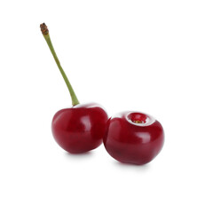 Two fresh ripe cherries isolated on white