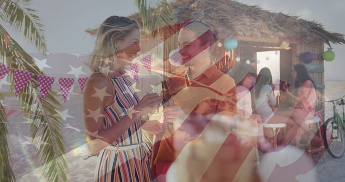 Sundress woman and polo-shirt man toasting wine glass, beer bottle in beach tiki bar with bicycle - Powered by Adobe