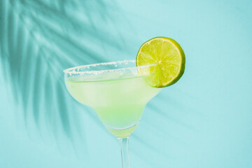 Margarita cocktail. Summer alcohol drink with silver tequila, liqueur, lime juice, sugar syrup,...