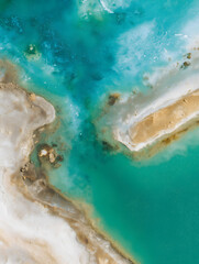 Obraz premium Aerial View of Turquoise Mineral Pools and Natural Formations