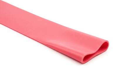 A close up of a pink heat shrink tube on white surface