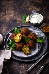 Middle Eastern falafel balls with sauce